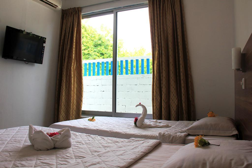 Rip Tide Vacation Inn, K.Guraidhoo Guraidhoo  Bagian luar foto